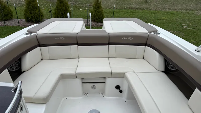 Slide: The Image of Interior of a 2013 Sea Ray 270 SLX with beige upholstery. - 9