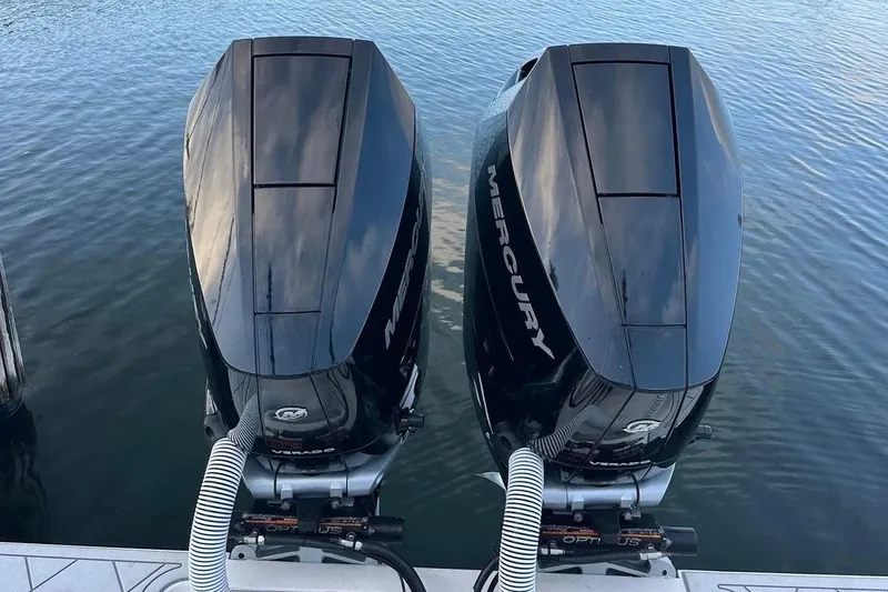 Slide: The Image of Twin Mercury outboard engines on a 2021 Invincible 33 Open Fisherman boat. - 10