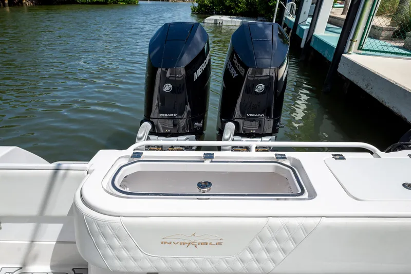 Slide: The Image of 2021 Invincible 33 Open Fisherman boat with dual Mercury Verado engines. - 18