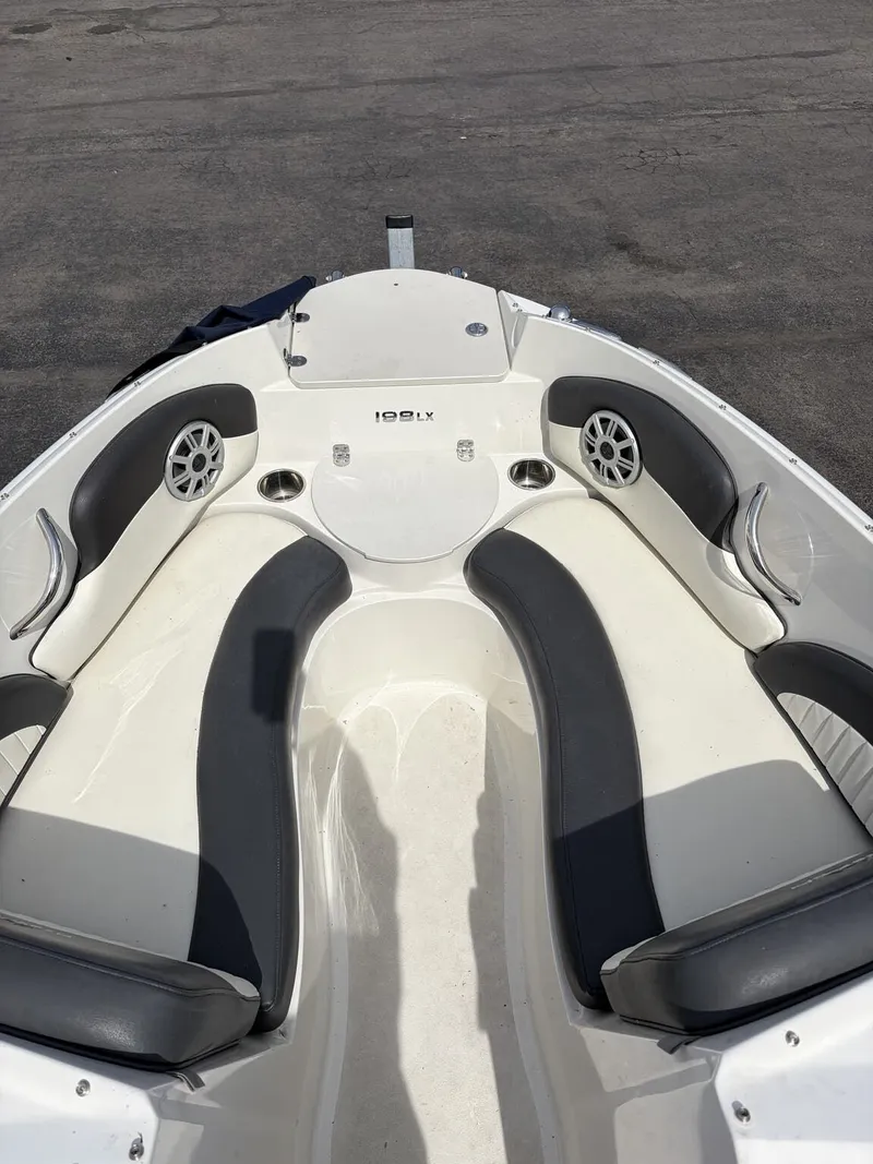 Slide: The Image of Interior of a 2018 Stingray 195 LX boat with seating. - 10