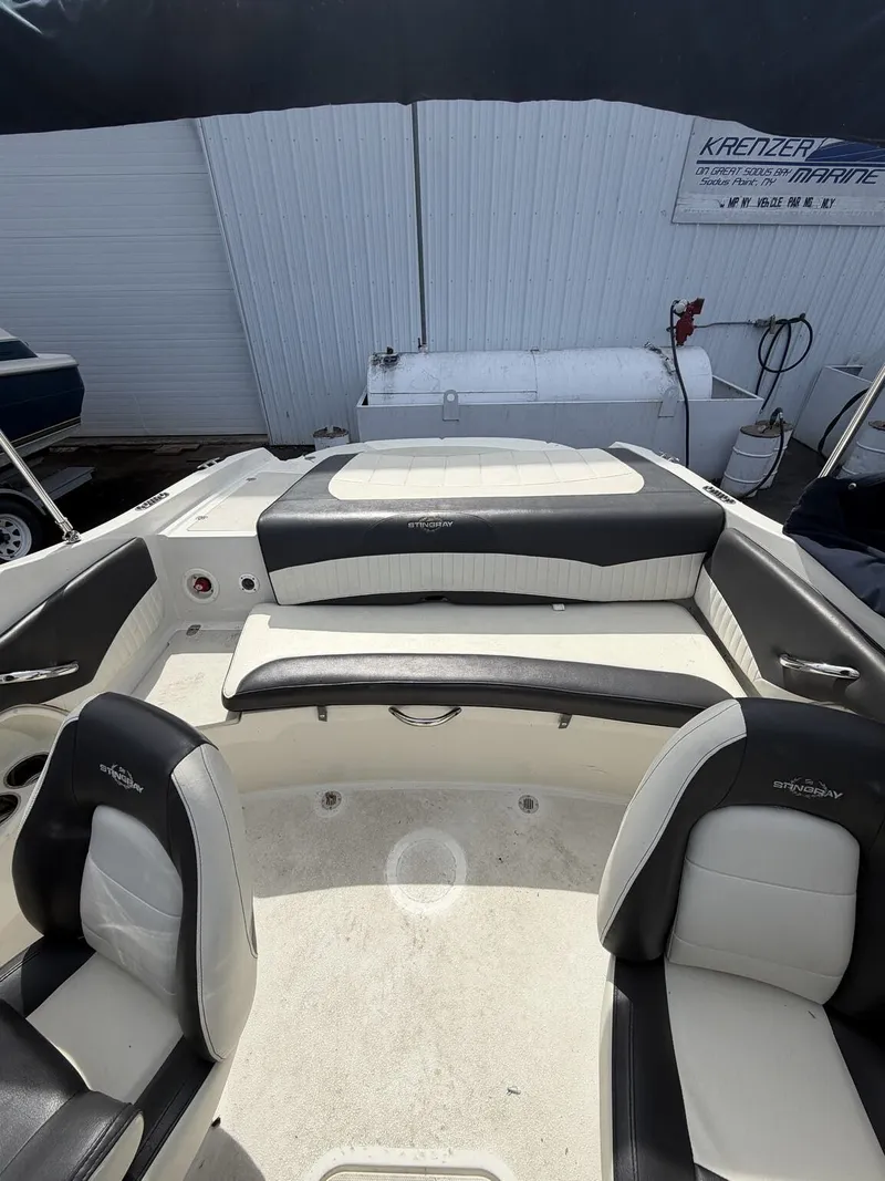 Slide: The Image of Interior of a 2018 Stingray 195 LX boat with seating. - 5