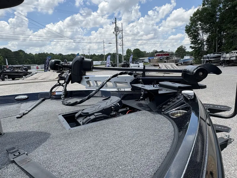 Slide: The Image of Ranger Z100 Series Z185 boat, 2021 model, parked outdoors on a sunny day. - 7