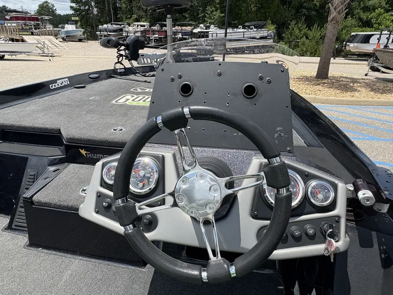 Slide: The Image of Steering wheel of a 2021 Ranger Z100 Series Z185 boat. - 13