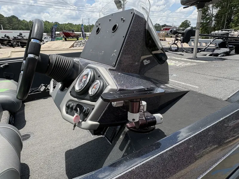 Slide: The Image of Ranger Z100 Series Z185 boat dashboard, 2021 model, featuring steering wheel and gauges. - 14