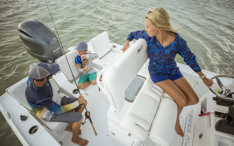 Slide: The Image of Family enjoying fishing on Sea Hunt BX 22 BR boat, 2026 model. - 11