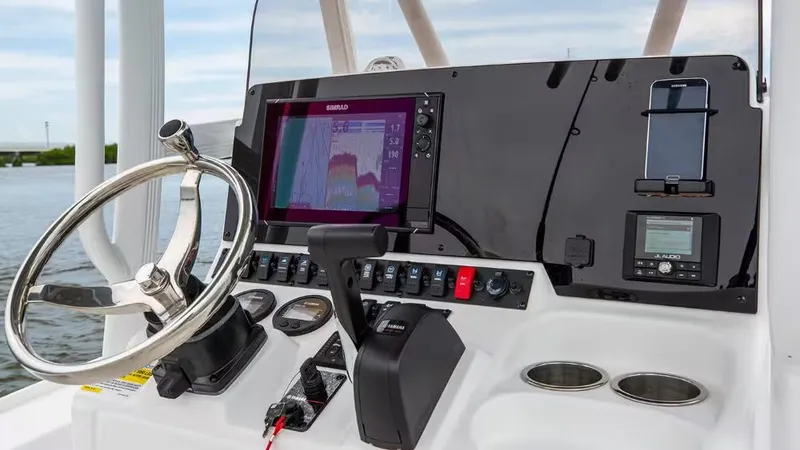 Slide: The Image of 2026 Sea Hunt BX 22 BR helm with advanced electronics. - 13