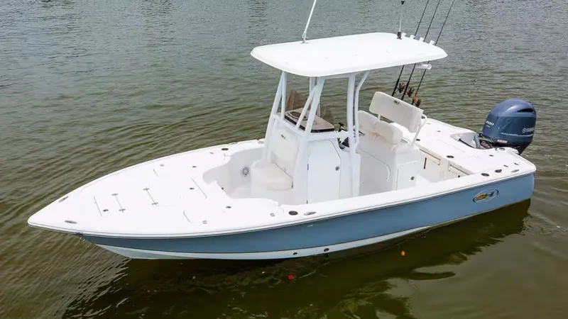 Slide: The Image of 2026 Sea Hunt BX 22 BR boat on calm water. - 3
