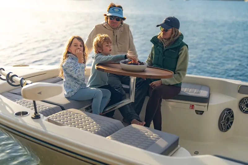 Slide: The Image of Family enjoying boat outing on 2026 Pathfinder 2800 Hybrid. - 19