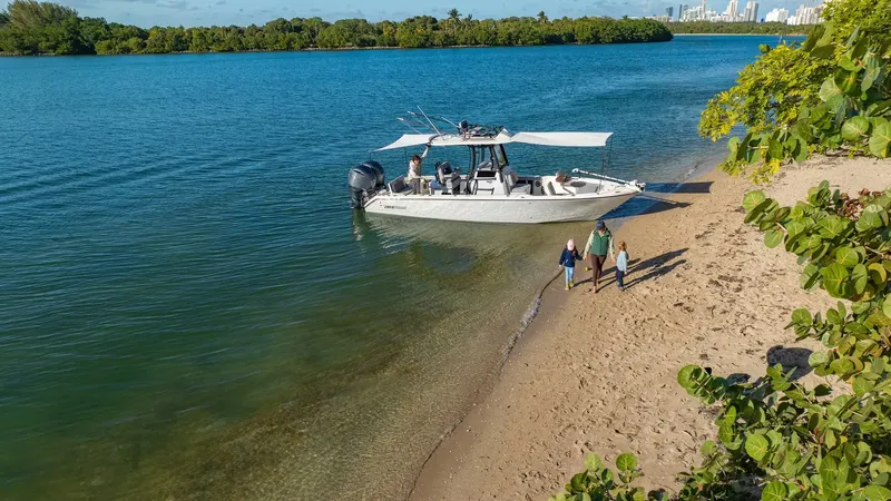 Slide: The Image of Pathfinder 2800 Hybrid 2026 at the beach with family. - 5
