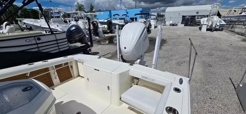 Slide: The Image of 2024 Pathfinder 2400 Open boat in a parking lot. - 10