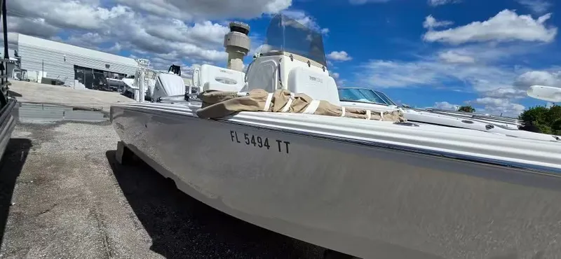 Slide: The Image of 2024 Pathfinder 2400 Open boat parked outdoors. - 3