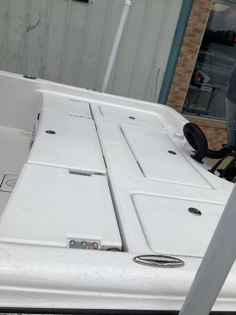 Slide: The Image of Blazer PureBay 2400 boat deck, 2026 model, featuring storage hatches. - 11