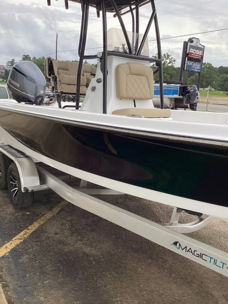 Slide: The Image of 2026 Blazer PureBay 2400 boat on a trailer. - 19