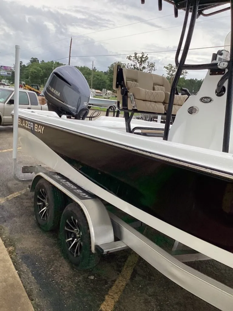 Slide: The Image of 2026 Blazer PureBay 2400 boat on trailer, Yamaha engine. - 20