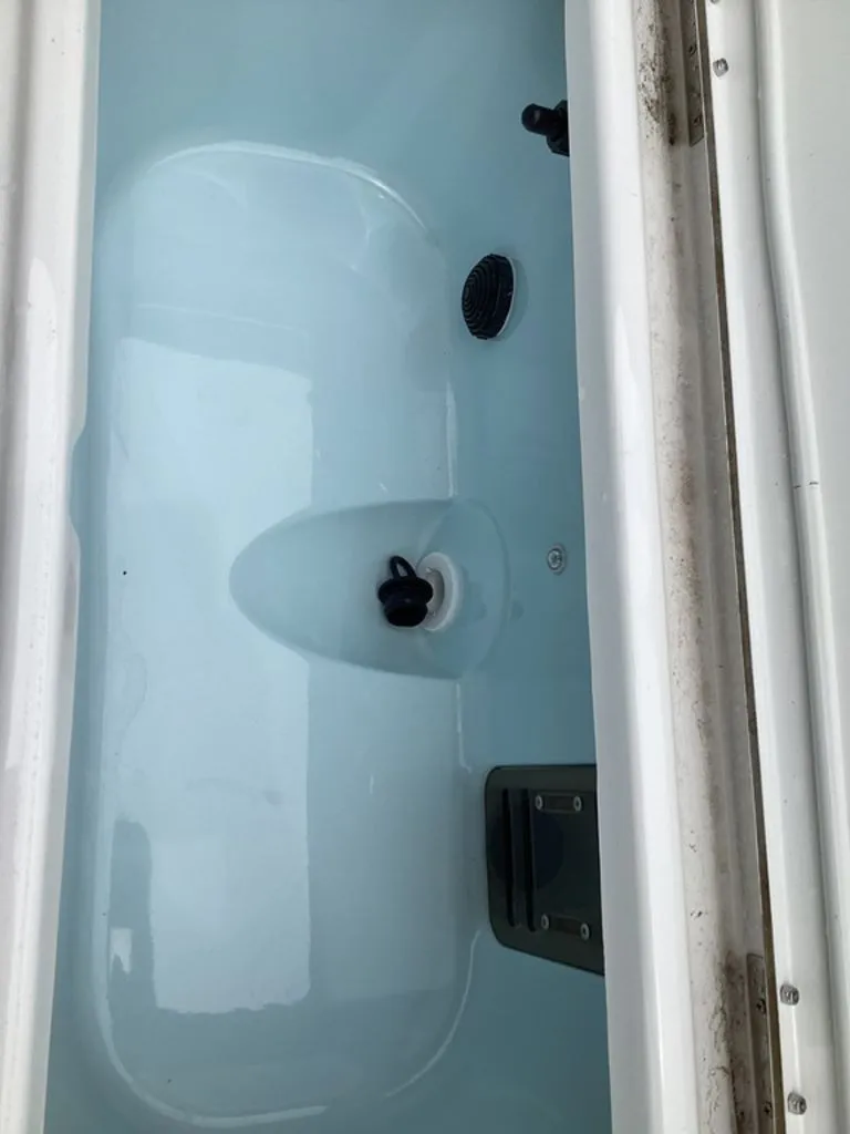Slide: The Image of Interior view of the 2026 Blazer PureBay 2400 boat model. - 29