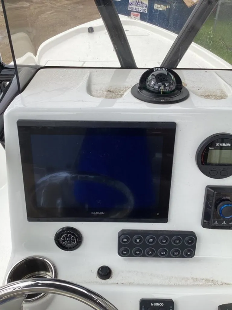 Slide: The Image of Dashboard of Blazer PureBay 2400 boat, model year 2026. - 35