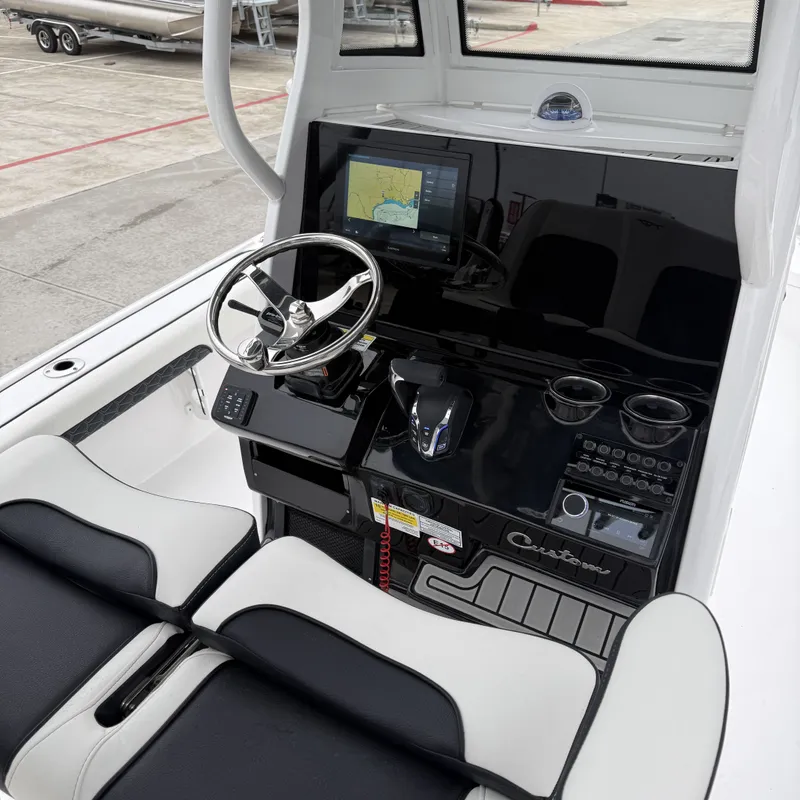 Slide: The Image of Interior view of 2026 Tidewater 2500 Carolina Bay boat cockpit. - 11