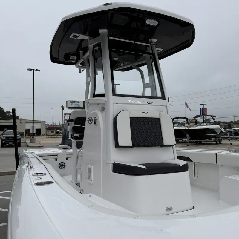 Slide: The Image of 2026 Tidewater 2500 Carolina Bay boat in a parking lot. - 17