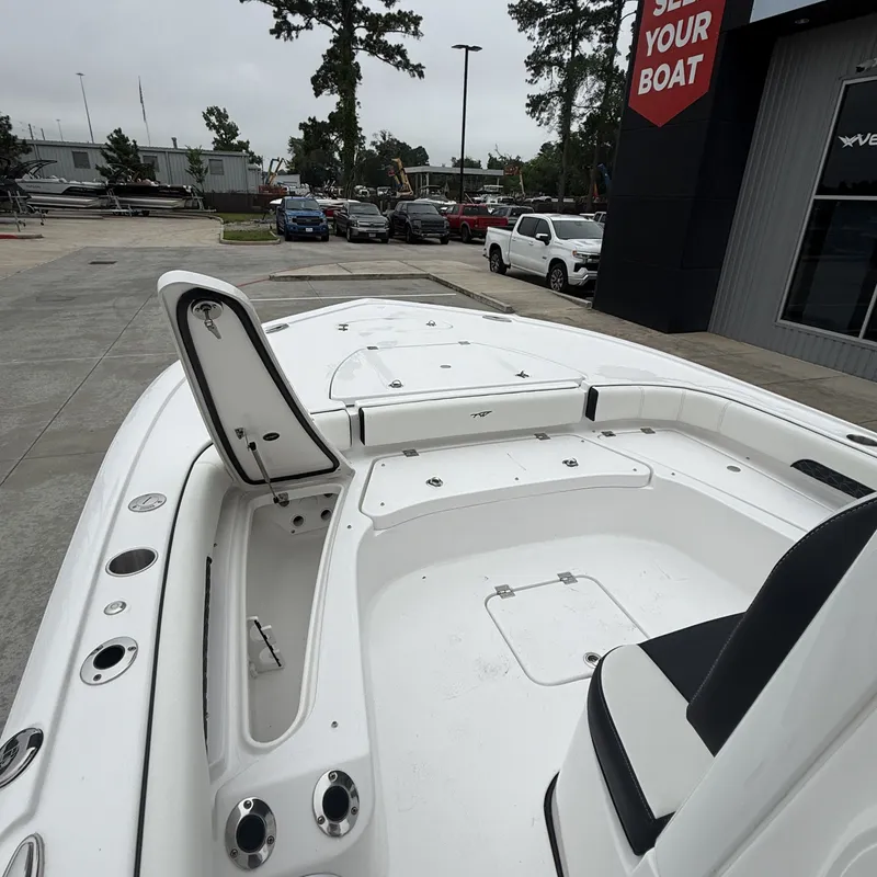 Slide: The Image of 2026 Tidewater 2500 Carolina Bay boat in showroom. - 20
