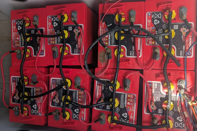 Slide: The Image of Red deep cycle batteries in a 2007 Duffy Cuddy Cabin 22 boat. - 3