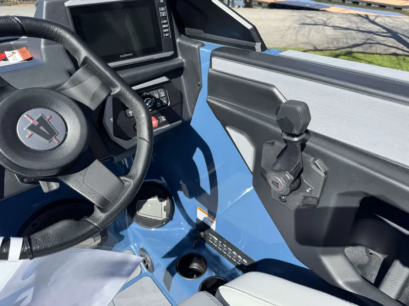 Slide: The Image of Interior view of Axis A225 boat, 2026 model, featuring steering wheel and dashboard. - 19