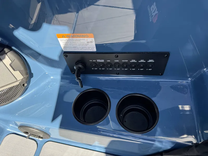 Slide: The Image of Dashboard of Axis A225 boat with switches and cup holders. - 20