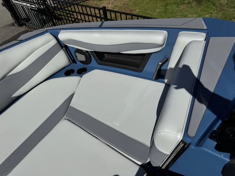 Slide: The Image of Interior of a 2026 Axis A225 boat with gray upholstery. - 25
