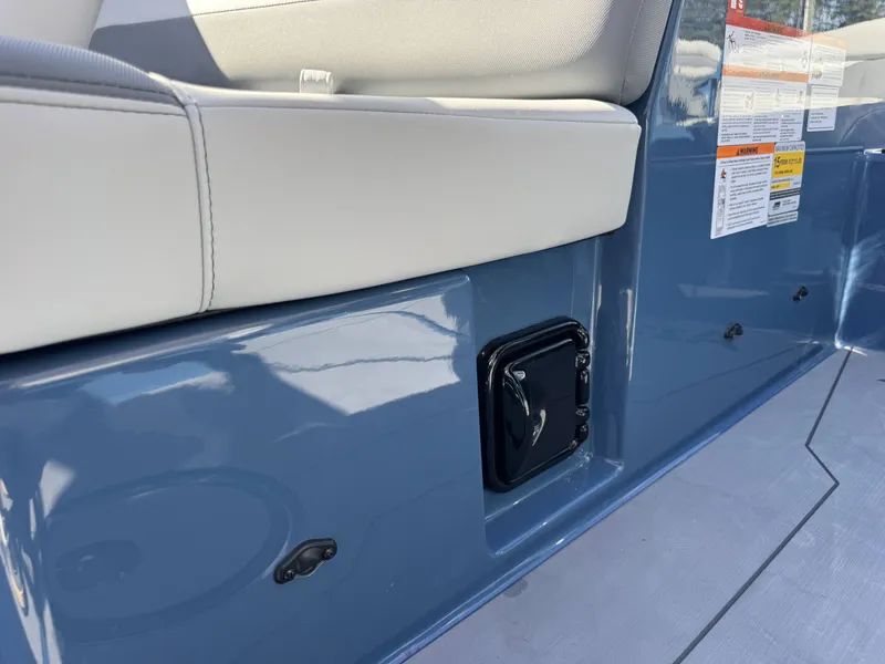Slide: The Image of Interior of Axis A225 boat, 2026 model, featuring blue paneling. - 27