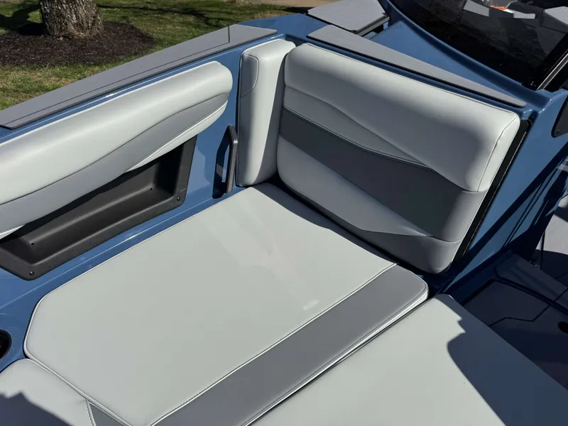 Slide: The Image of Interior of Axis A225 boat, 2026 model, featuring gray upholstery. - 30