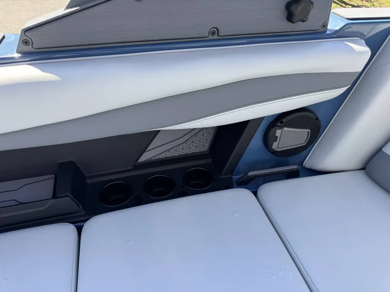 Slide: The Image of Interior of Axis A225 boat, 2026 model, featuring speaker and cup holders. - 33