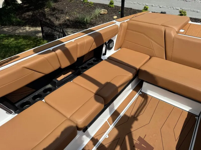 Slide: The Image of Luxurious brown leather seating in Axis T250 boat, model 2026. - 11