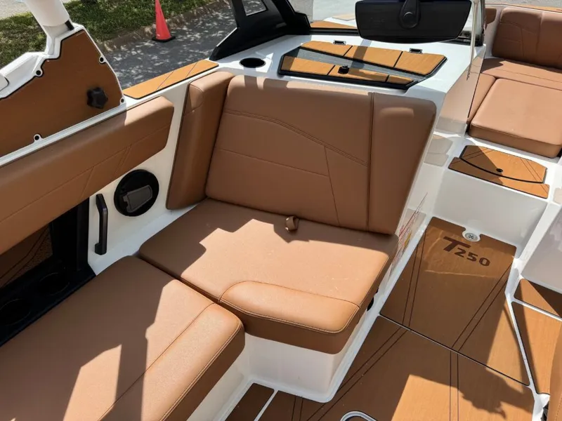 Slide: The Image of Interior of Axis T250 boat, brown upholstery, model year 2026. - 12