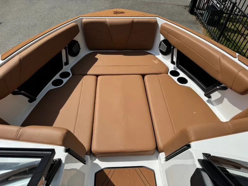 Slide: The Image of Interior of Axis T250 boat, 2026 model, featuring brown leather seats. - 15