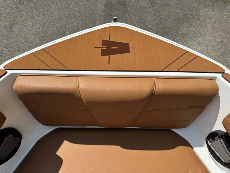 Slide: The Image of 2026 Axis T250 boat with brown upholstery and modern design. - 17