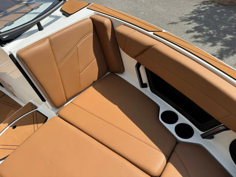 Slide: The Image of Interior of Axis T250 boat, brown leather seats, model year 2026. - 19