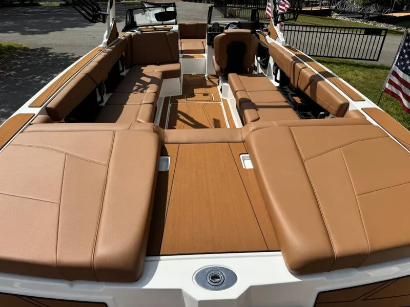 Slide: The Image of Luxurious Axis T250 boat 2026 with brown leather seating. - 3