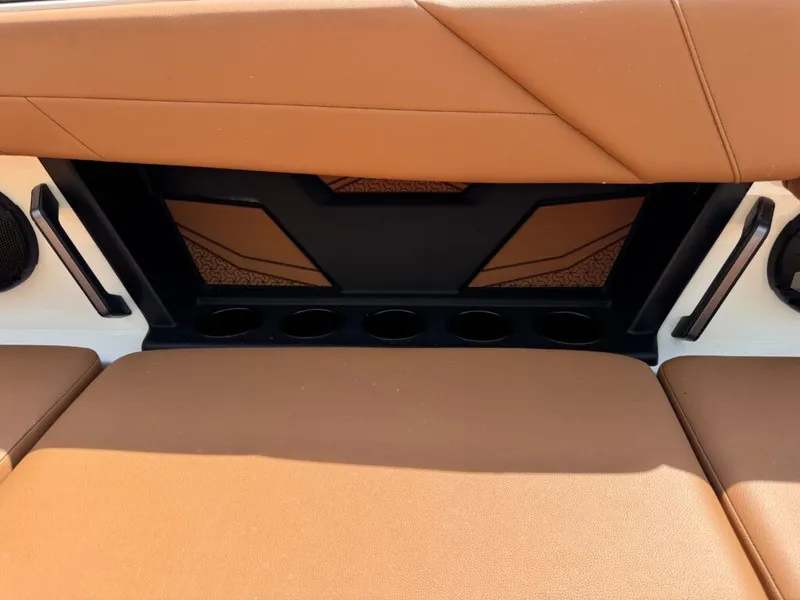 Slide: The Image of Interior of 2026 Axis T250 with brown leather seats. - 7