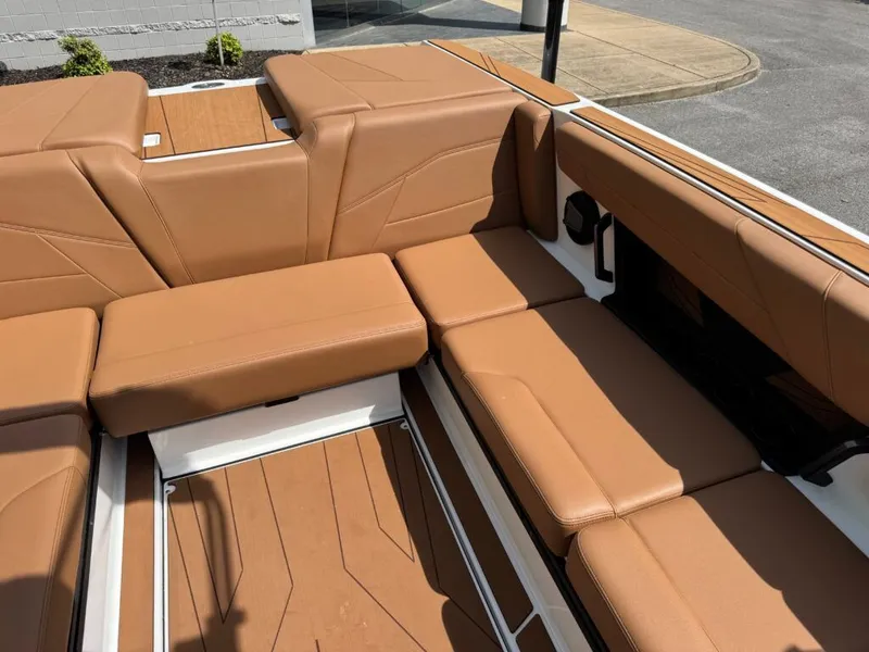Slide: The Image of Luxurious brown leather seating in Axis T250 boat, model 2026. - 9