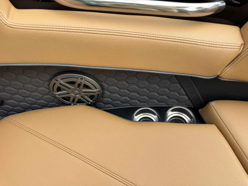 Slide: The Image of Interior of 2026 Cobalt R6 Surf with speaker and cup holders. - 22