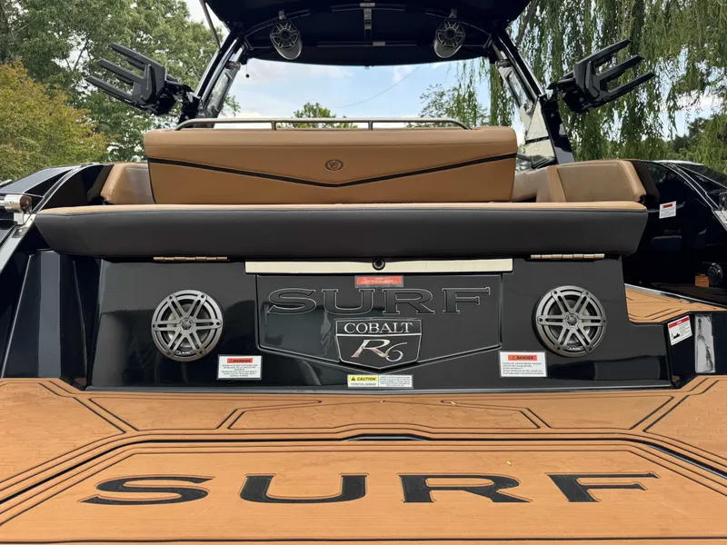 Slide: The Image of Rear view of 2026 Cobalt R6 Surf with speakers and seating area. - 34