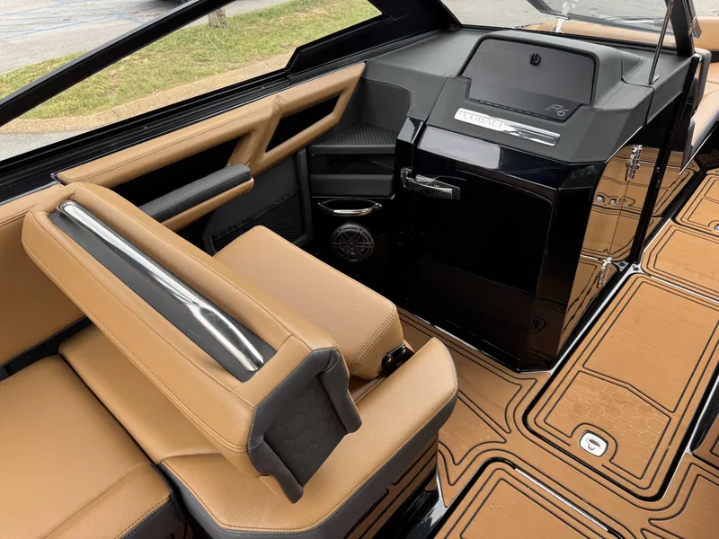 Slide: The Image of Interior of 2026 Cobalt R6 Surf with sleek leather seating. - 6
