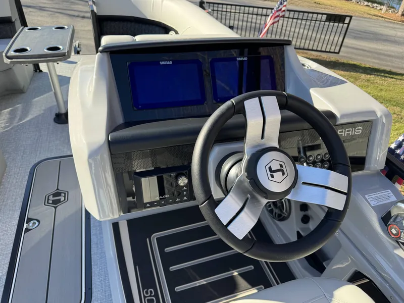 Slide: The Image of Steering wheel and dashboard of Harris Solstice 230 SLDH 2026. - 10