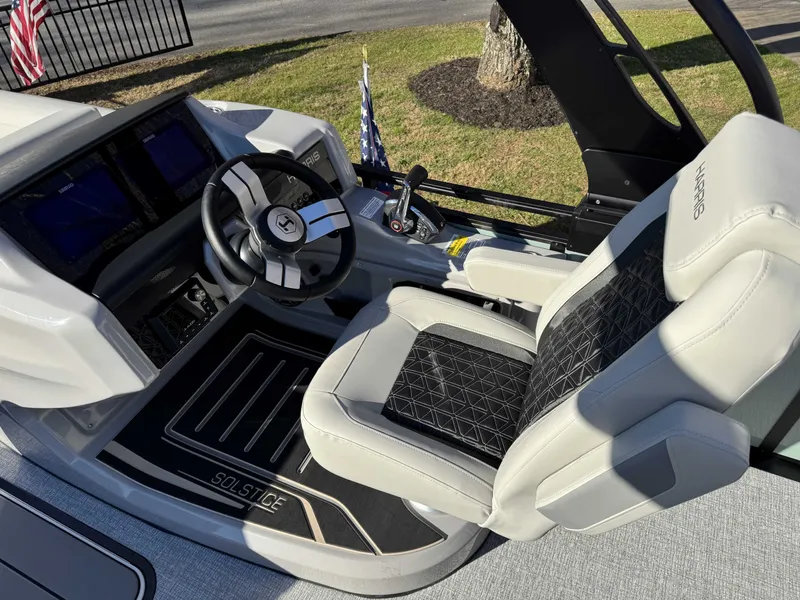 Slide: The Image of Interior of 2026 Harris Solstice 230 SLDH with modern helm station. - 15