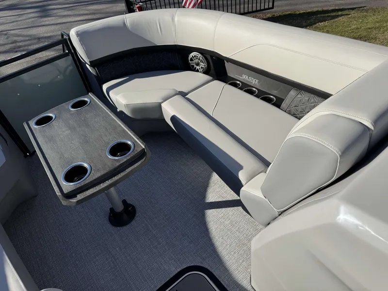 Slide: The Image of Interior of 2026 Harris Solstice 230 SLDH with gray upholstery and table. - 19
