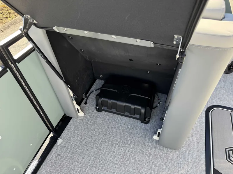 Slide: The Image of Interior of 2026 Harris Solstice 230 SLDH with storage compartment. - 30