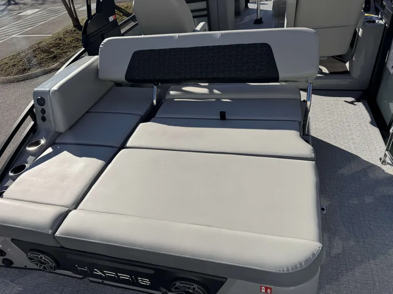 Slide: The Image of 2026 Harris Solstice 230 SLDH boat with luxurious lounge seating. - 6