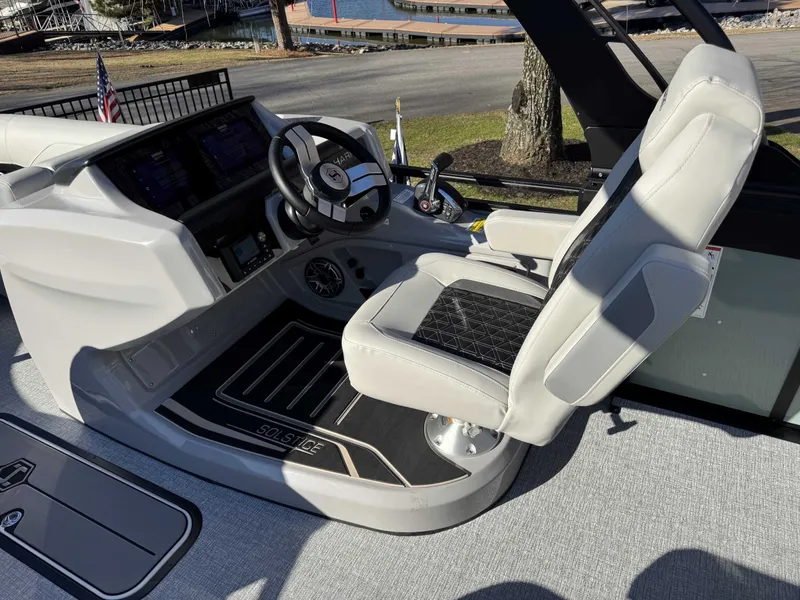 Slide: The Image of Interior of 2026 Harris Solstice 230 SLDH with helm console and seat. - 9