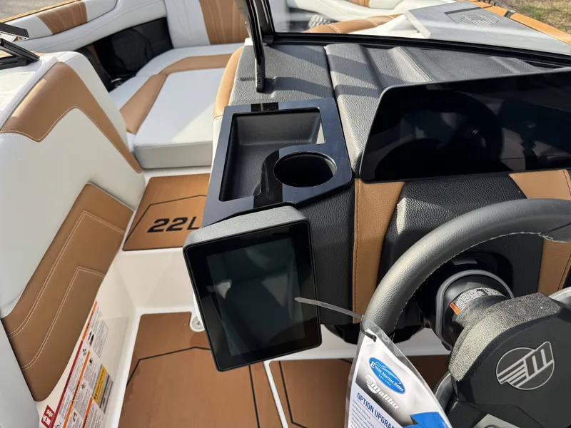 Slide: The Image of Interior of 2026 Malibu Wakesetter 22 LSV with modern dashboard. - 11