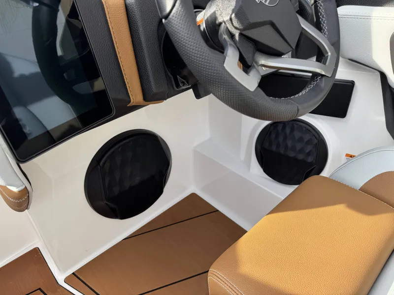 Slide: The Image of Interior of 2026 Malibu Wakesetter 22 LSV with steering wheel and speakers. - 12