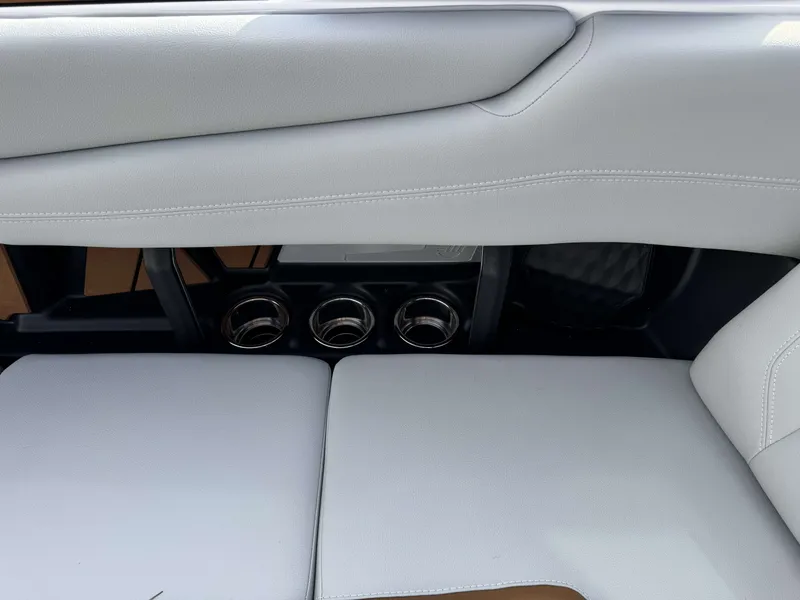 Slide: The Image of 2026 Malibu Wakesetter 22 LSV interior with white seating. - 14